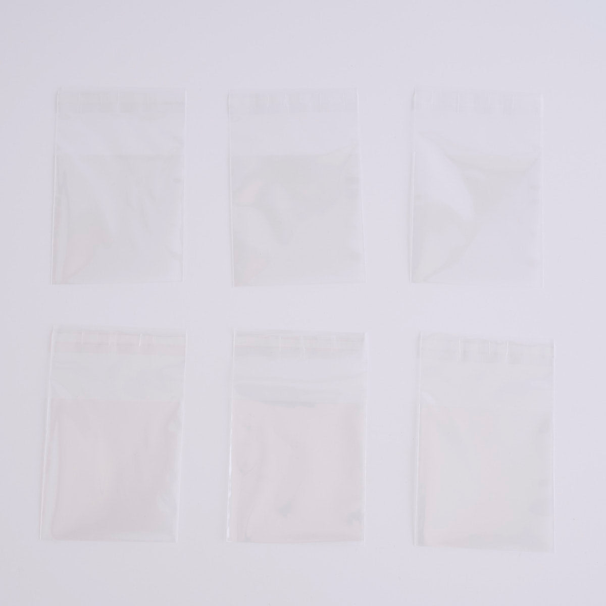 PPクリアーポケット テープ付 缶バッチ57mm用 30枚入 338764